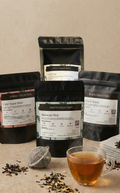 Tea packaging and a cup of tea on a textured surface